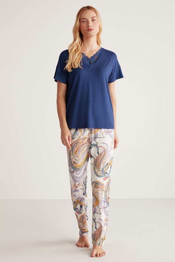 Pyjama à haut bleu uni avec dentelle et  pantalon imprimé