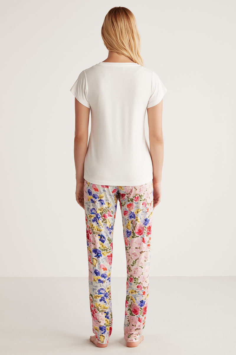 Pyjama à haut blanc neige et pantalon à motif fleuri