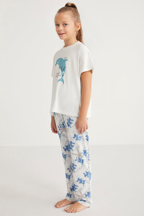 Pyjama fille à haut blanc et pantalon motif fleuri