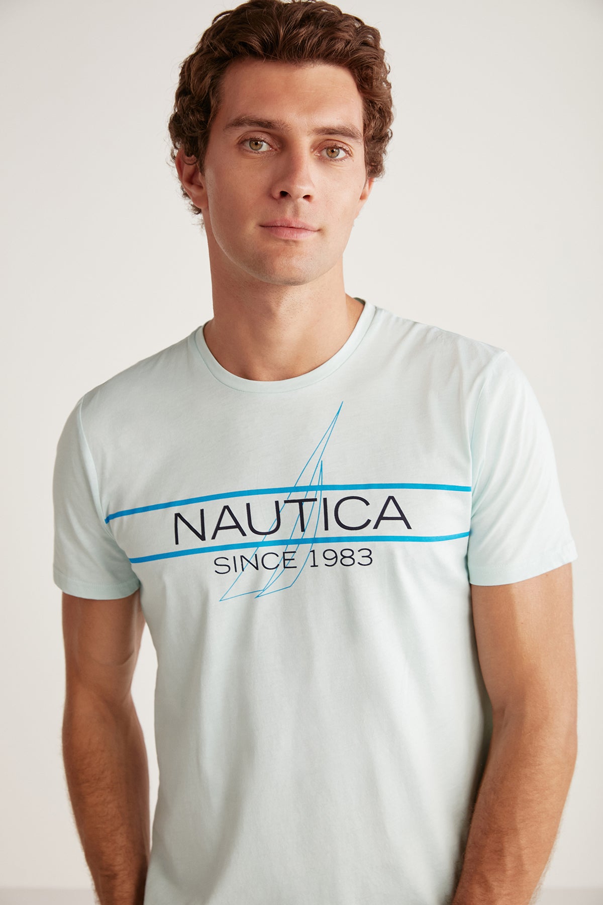 Ensemble homme à haut vert d'eau et pantalon bleu uni