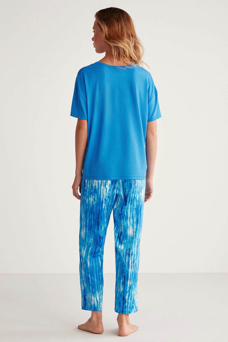 Pyjama bleu à t-shirt uni et pantalon imprimé