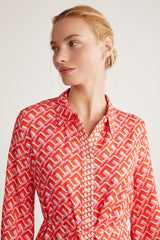 Robe longue à boutons orange et rose à motif géométrique