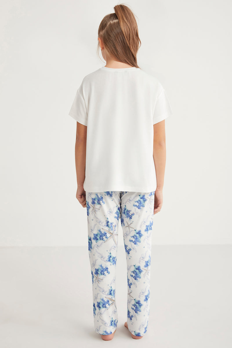 Pyjama fille à haut blanc et pantalon motif fleuri